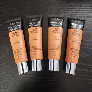 L'Oreal Prime Lab 24H Dullness Reducer - Black and Orange